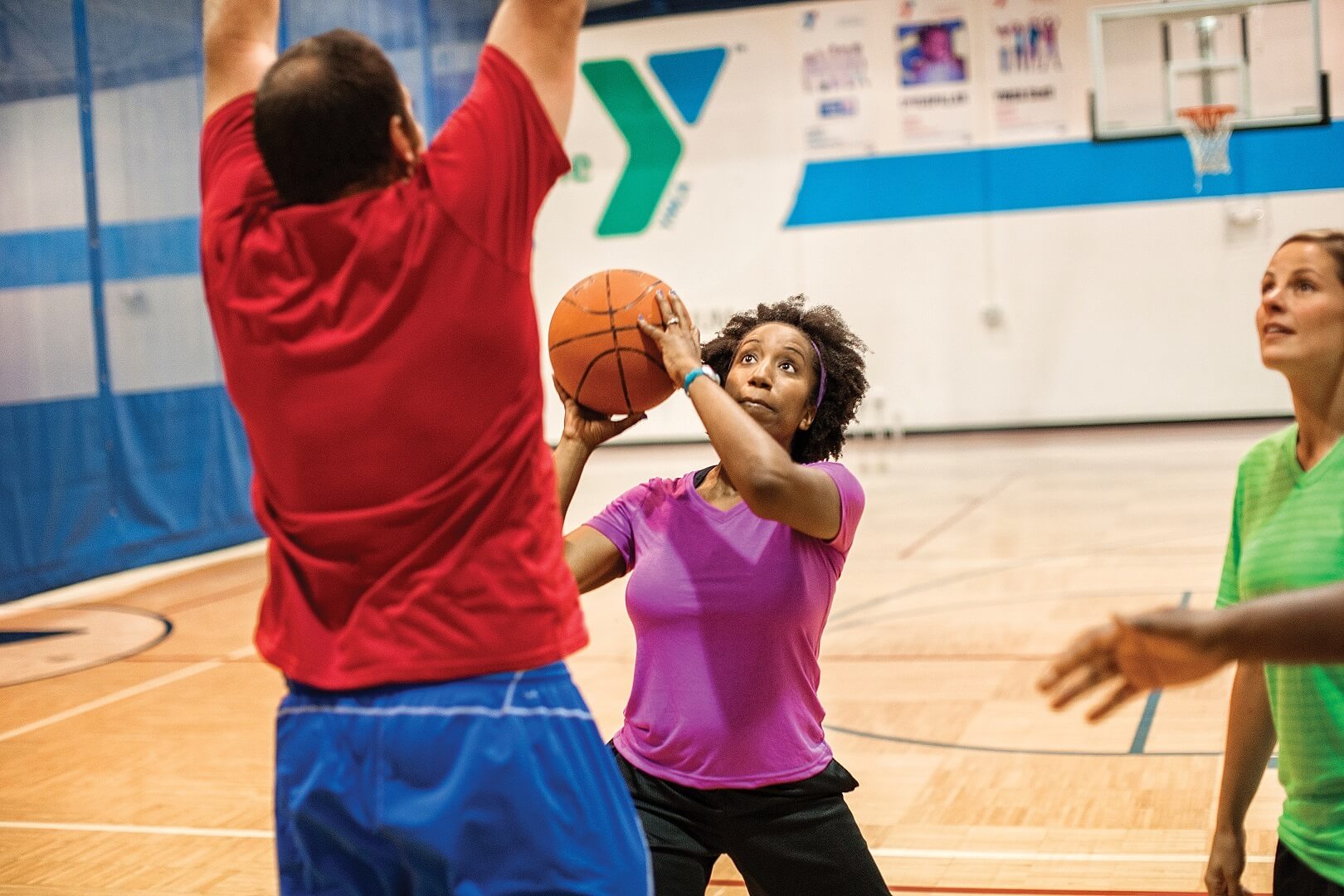 YMCA Louisville members playing community basketball YMCA Louisville members playing community basketball