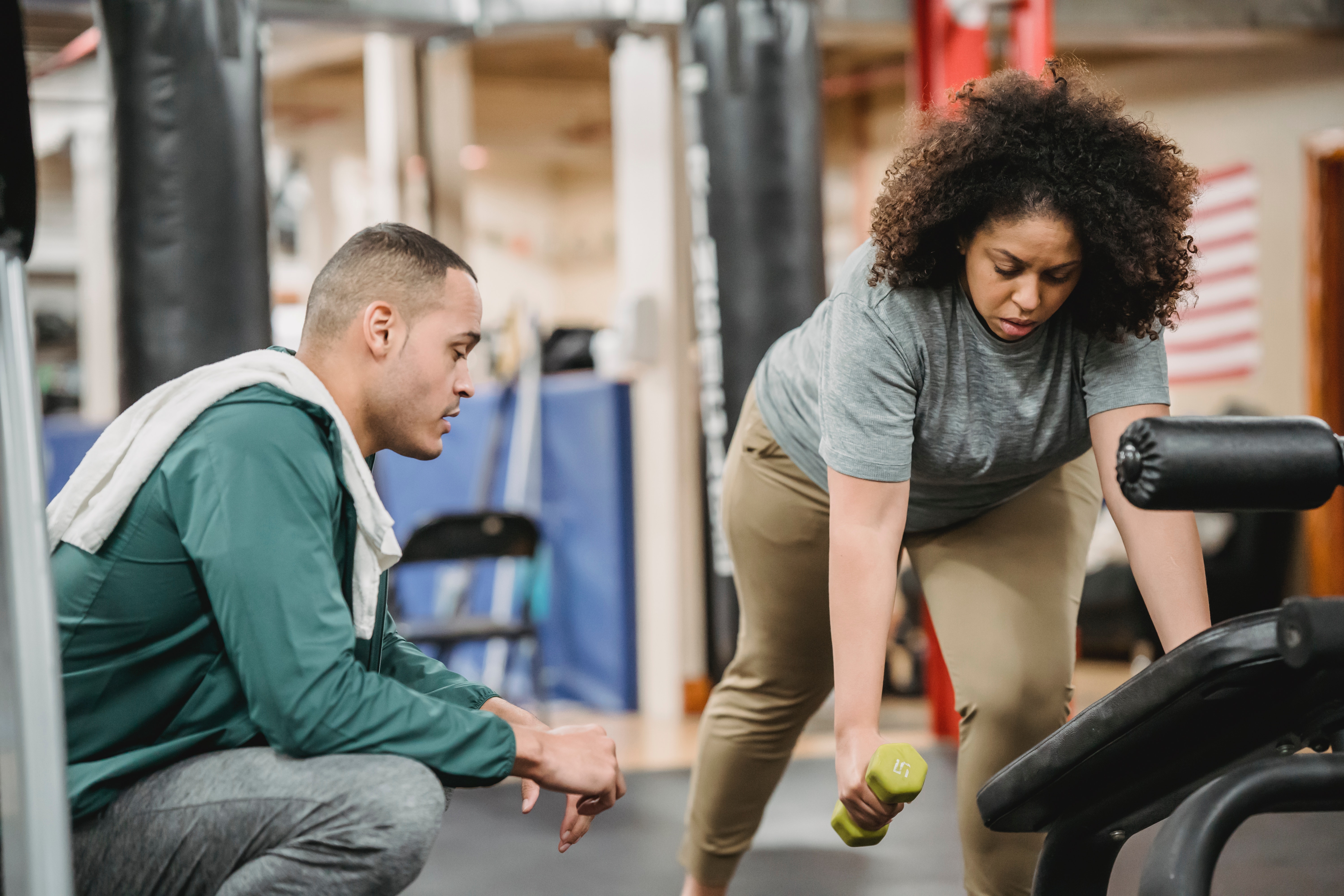 YMCA Louisville trainer coaching member for fitness assessment YMCA Louisville trainer coaching member for fitness assessment