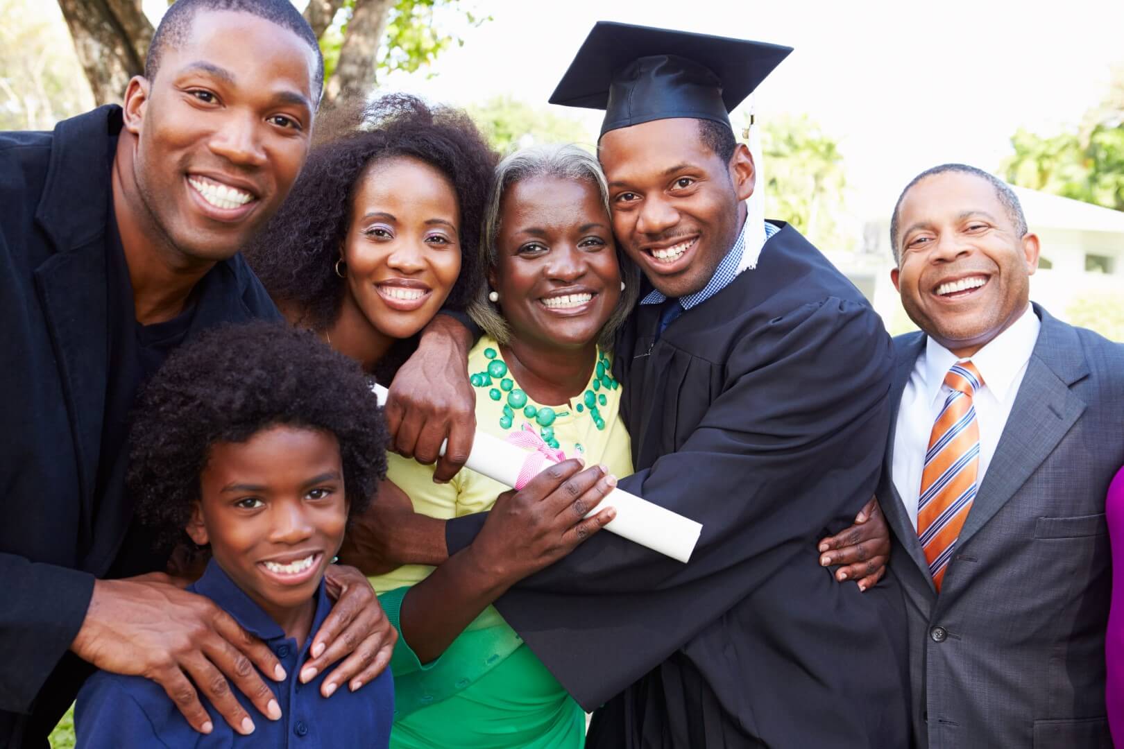 Family smiling together at graduation Family smiling together at graduation