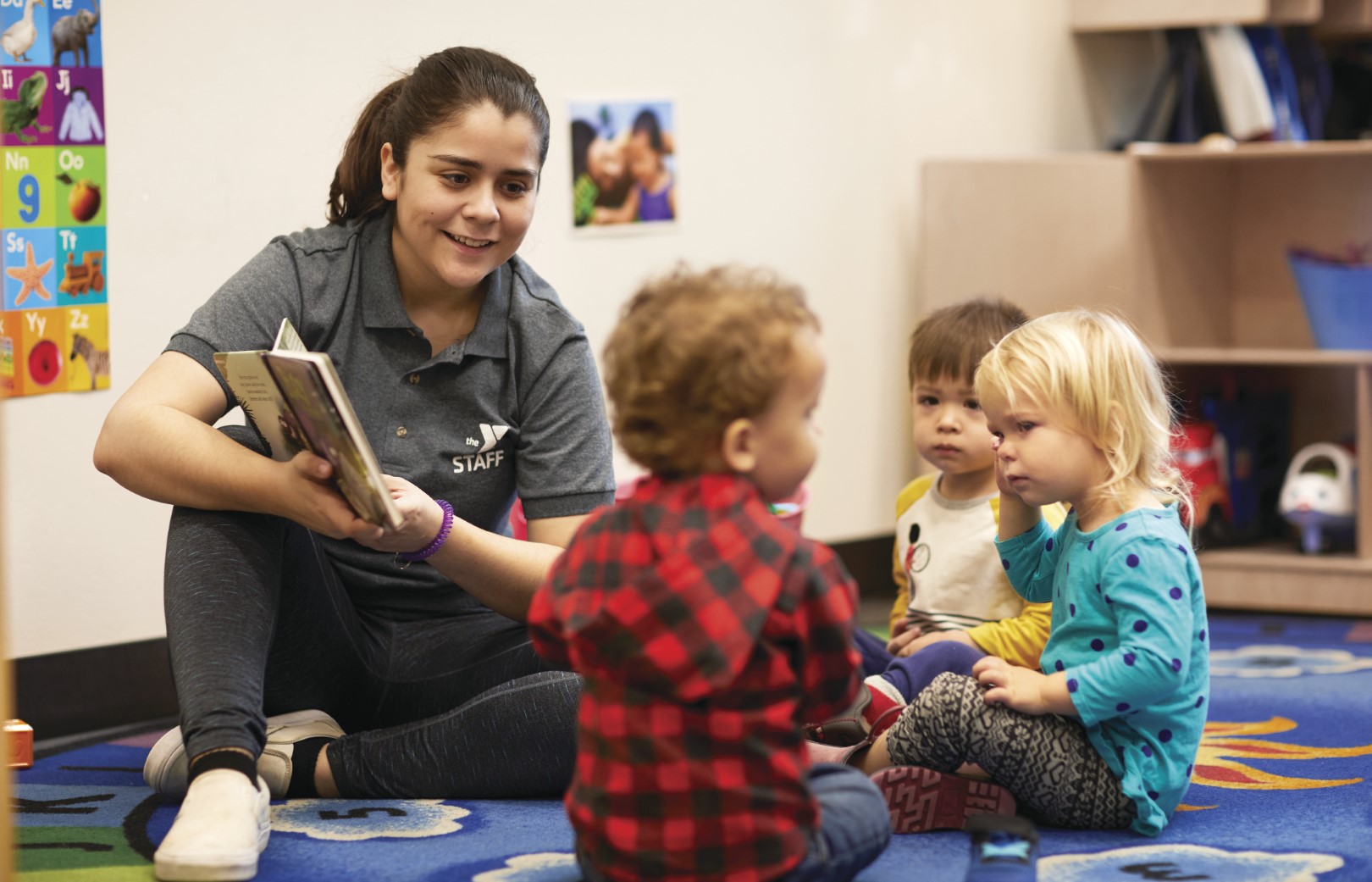 YMCA Louisville staff babysitting three little kids YMCA Louisville staff babysitting three little kids