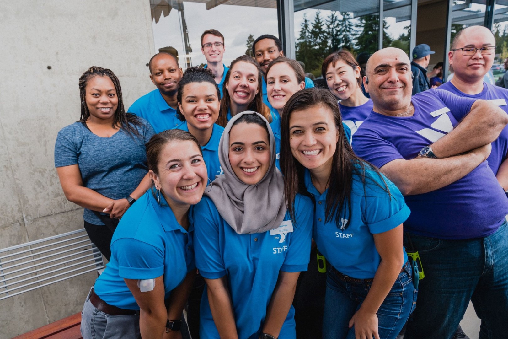 YMCA staff pose for a photo together YMCA staff pose for a photo together