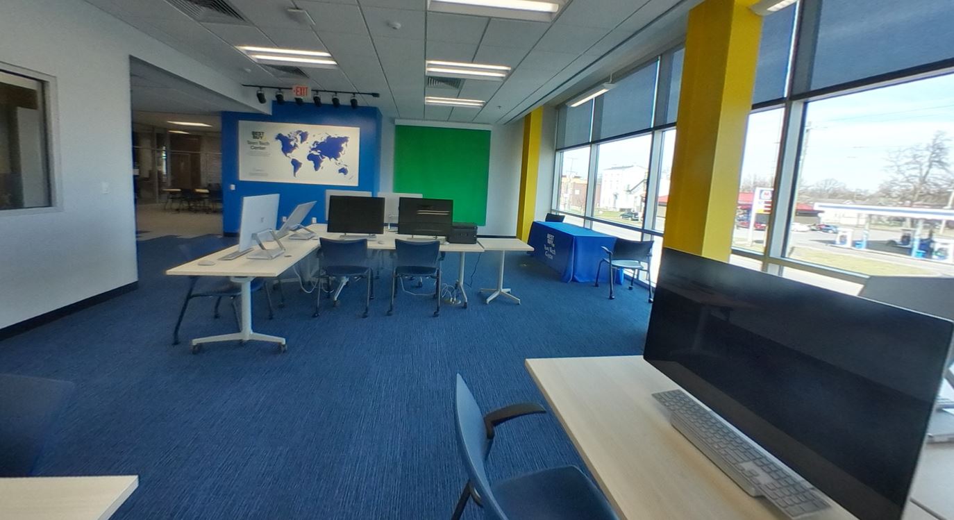 Computers on desks in the Teen Tech Center