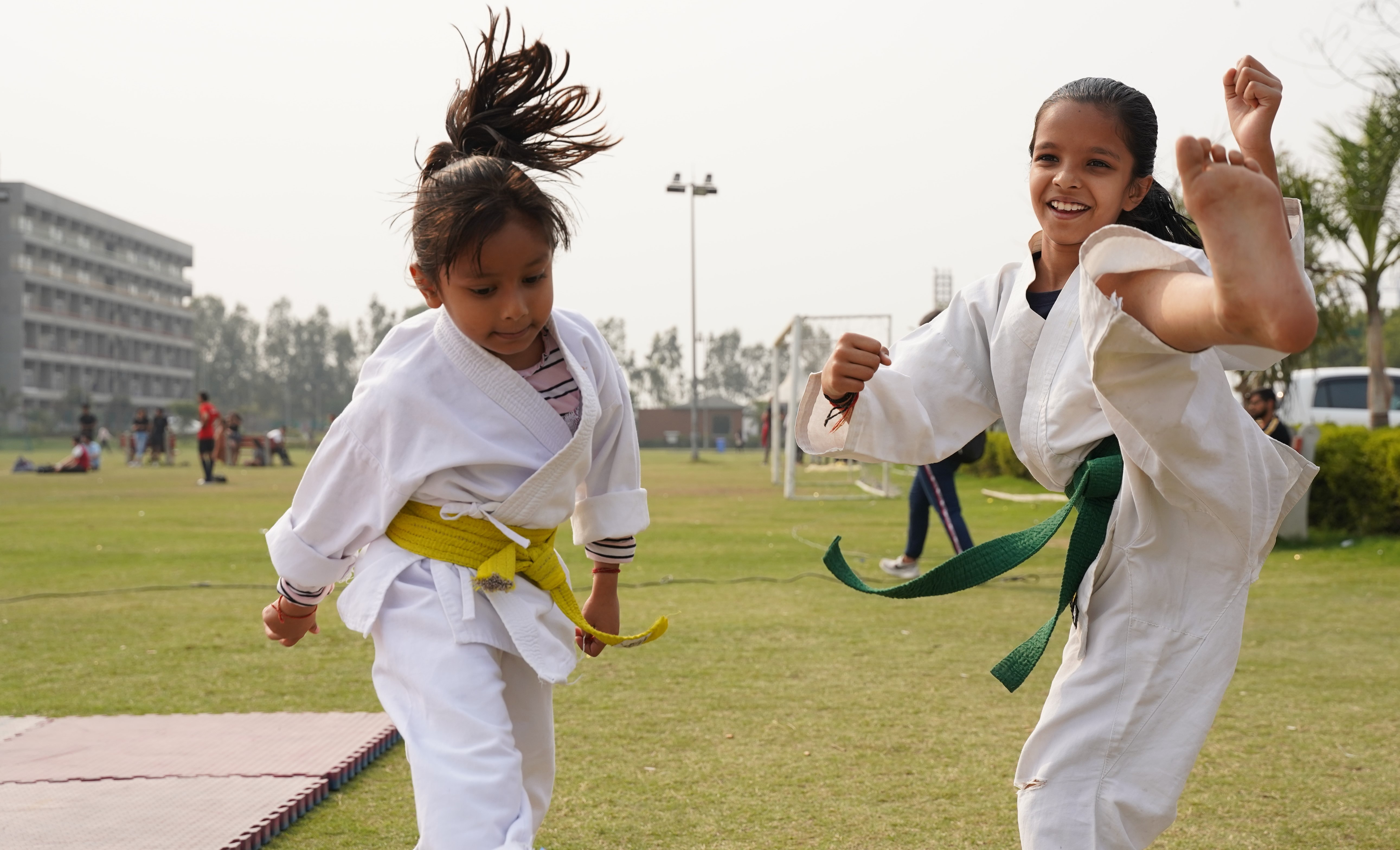Kids practicing martial arts outdoors Kids practicing martial arts outdoors