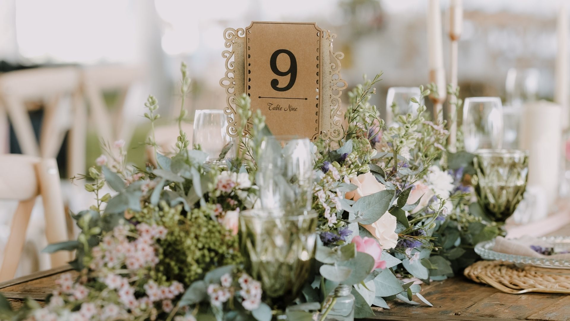 Flower arrangement on table at wedding reception Flower arrangement on table at wedding reception