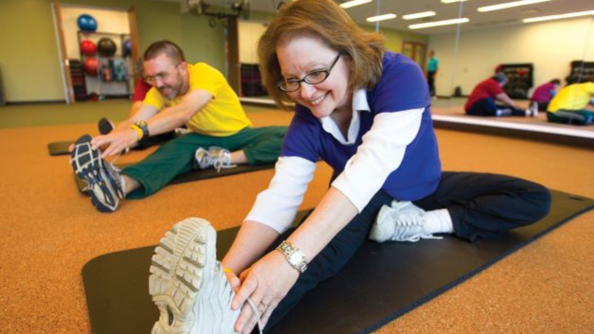 LIVESTRONG program participants stretching LIVESTRONG program participants stretching