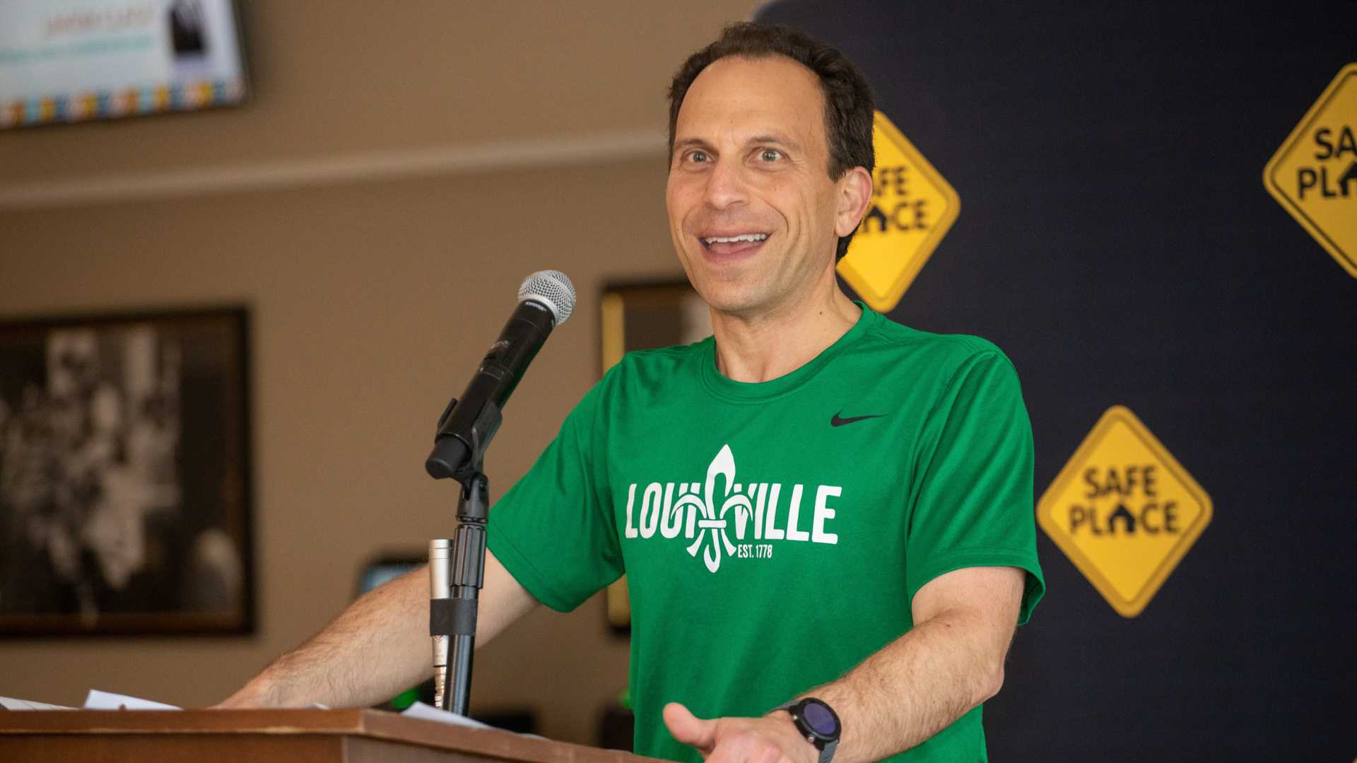 Man standing on podium 