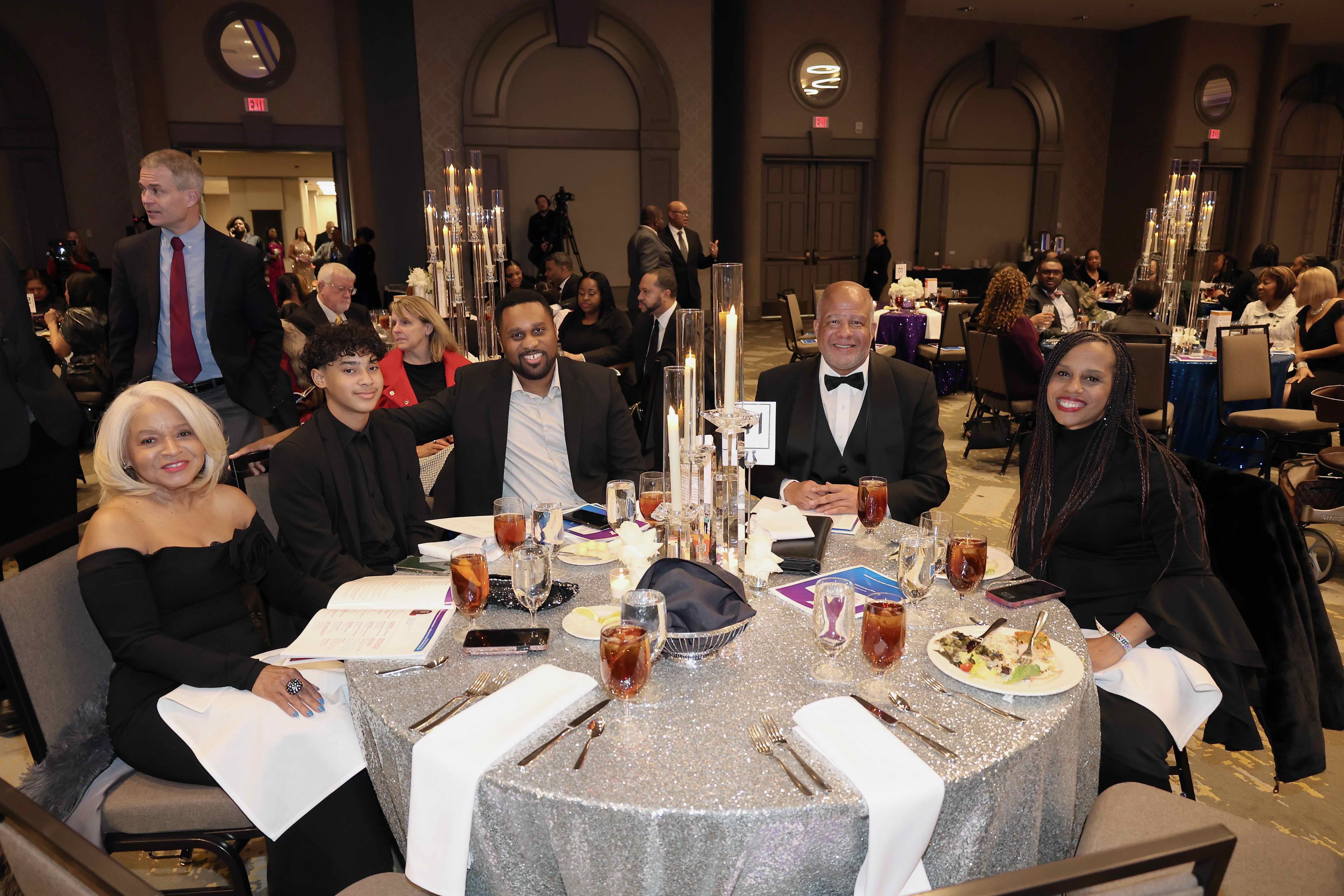 Group of adults sitting at a table