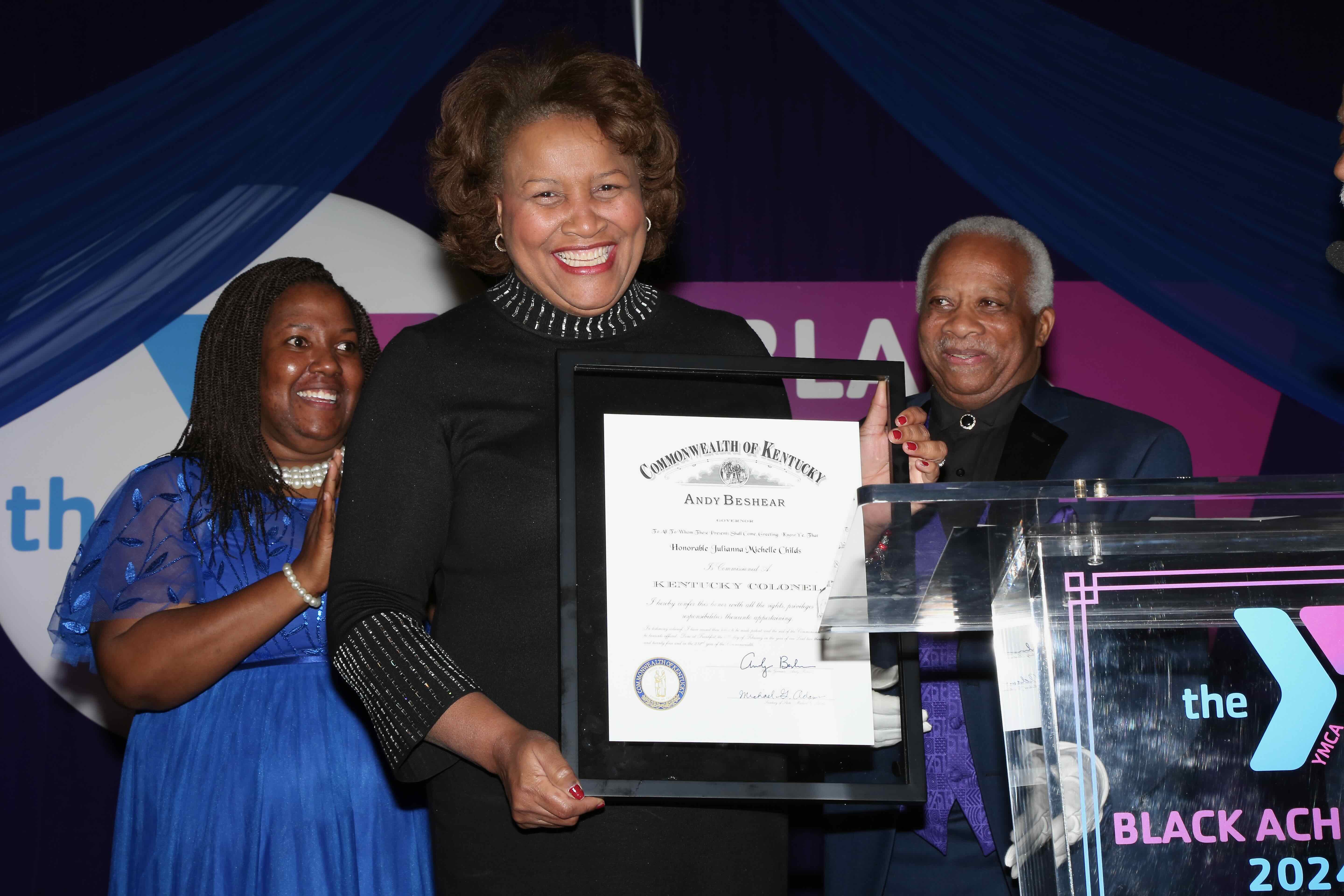 Judge J. Mitchell Childs holding award