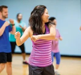 Adults dancing at group dance class at YMCA Louisville