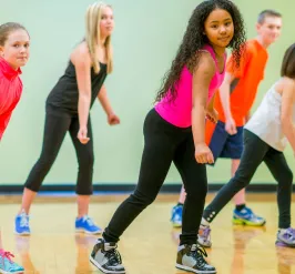 Group of kids preparing for a dance performance