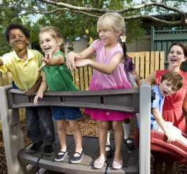 Children and parent at playground
