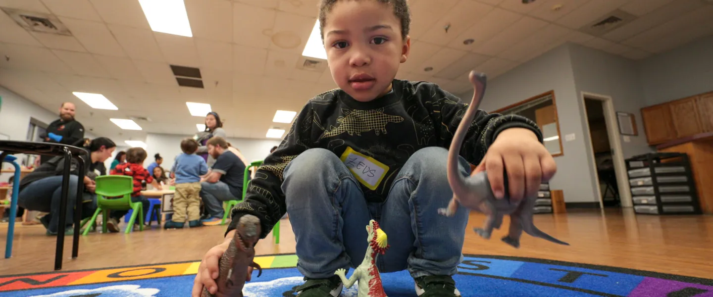 Child playing with toys