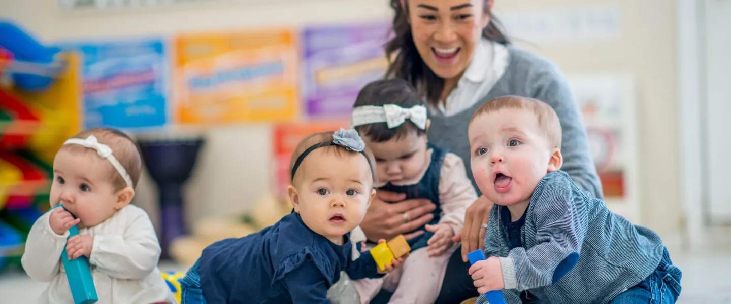 Happy young kids at a YMCA preschool program