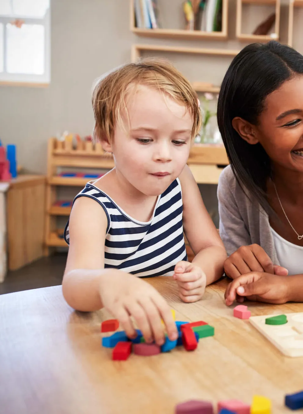 YMCA staff engages kids at child development center