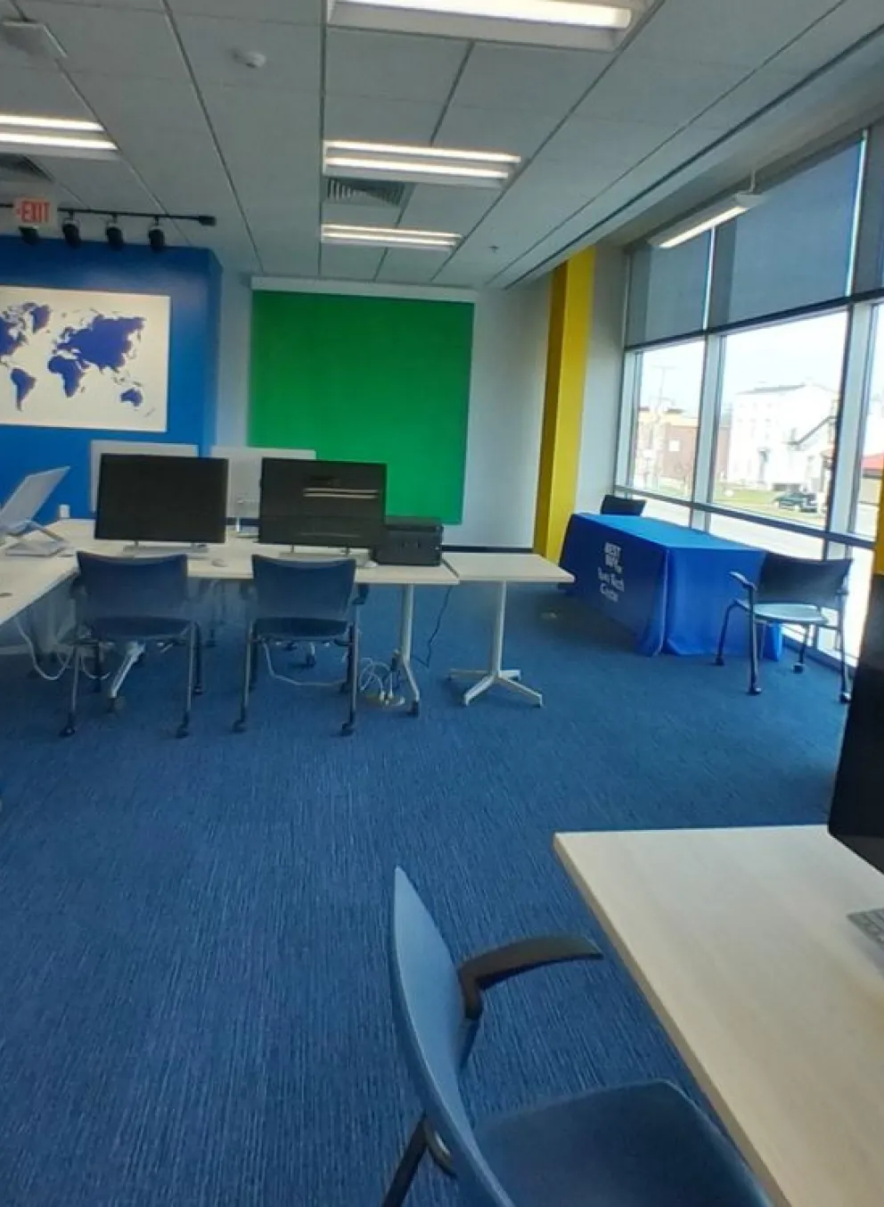 Computers on desks in the Teen Tech Center