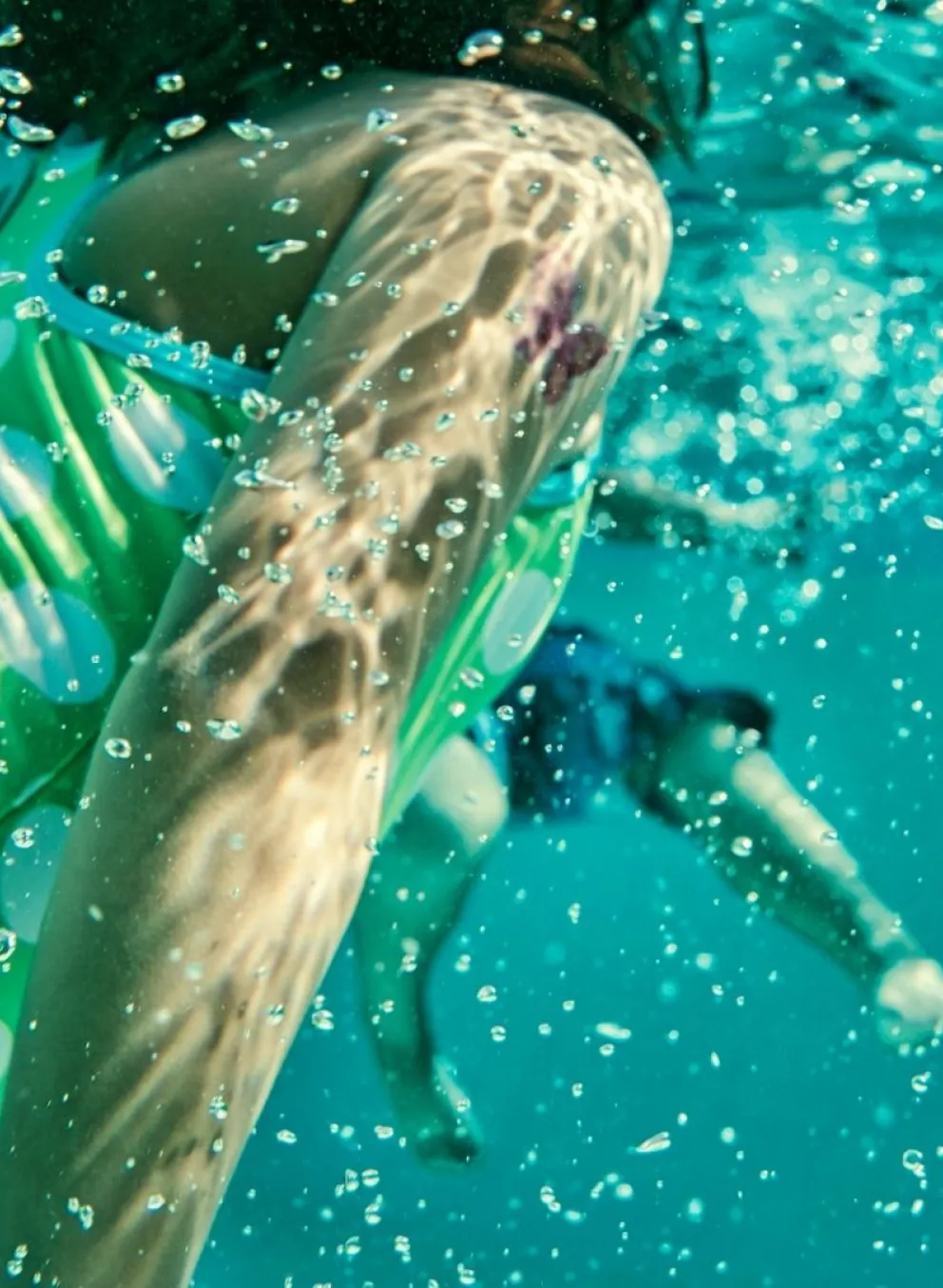 Girl in pool swimming