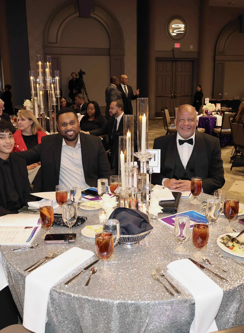 Group of adults sitting at a table