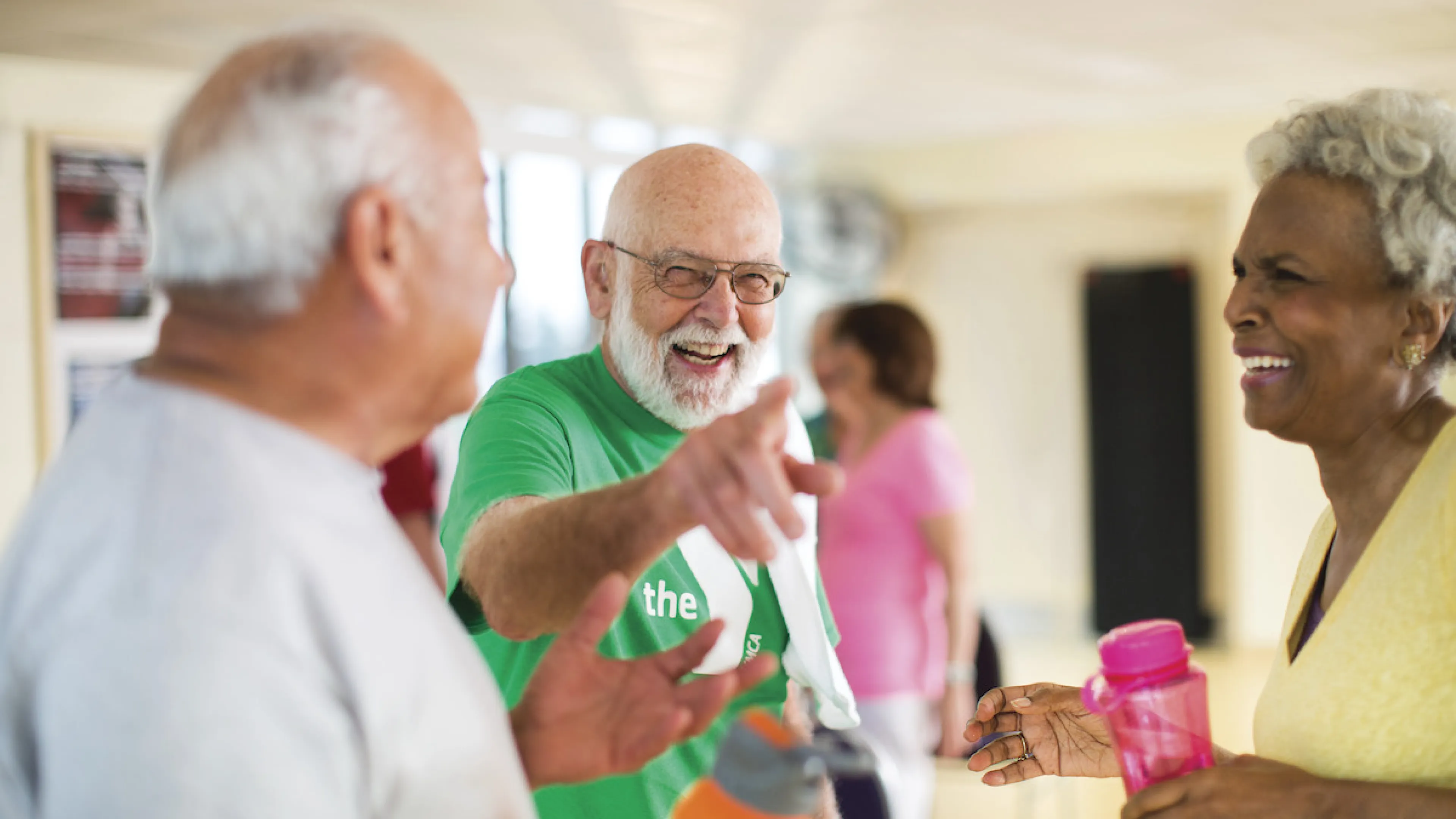 Older adults participating in a healthy living challenge laughing together