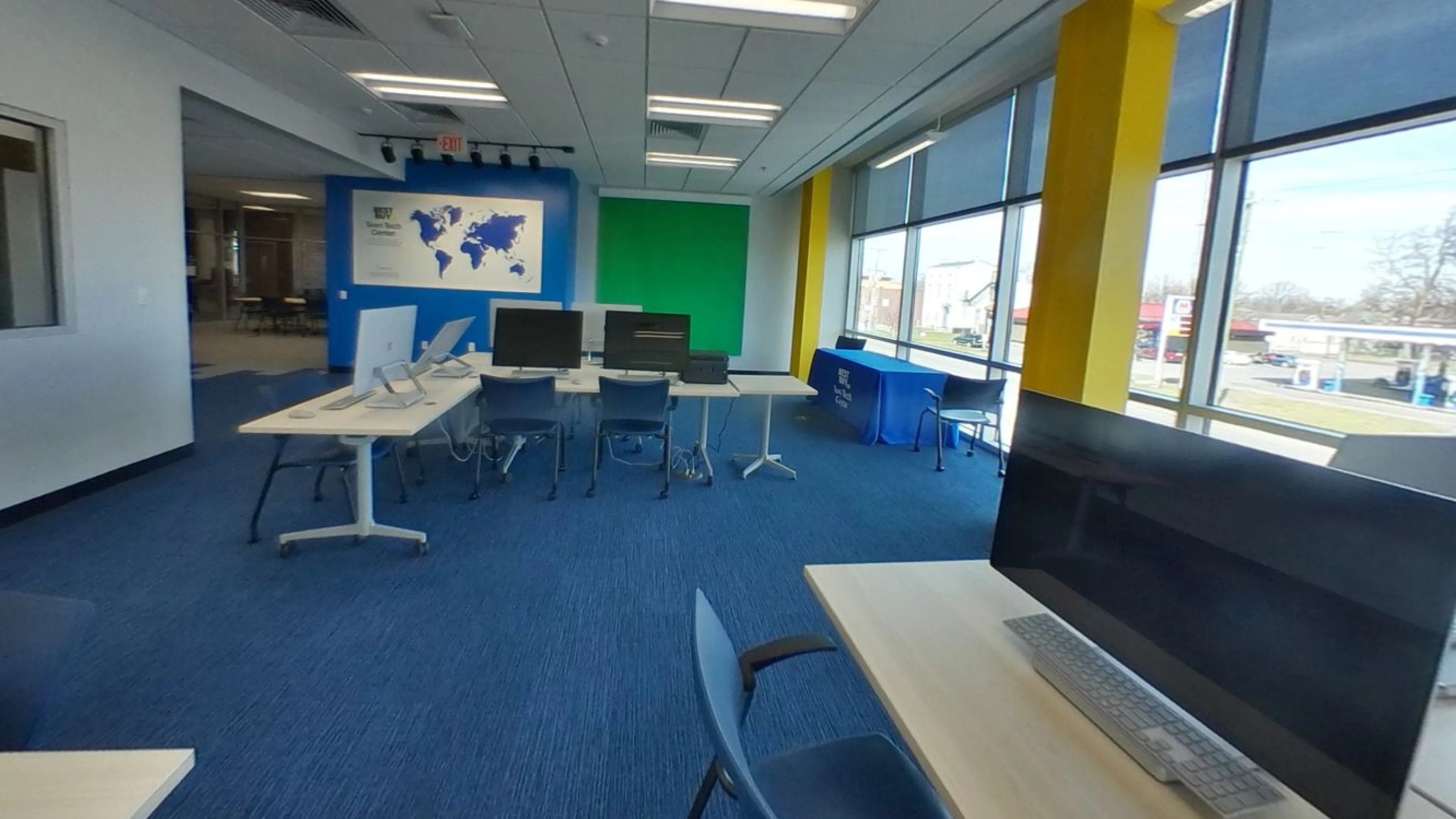 Computers on desks in the Teen Tech Center