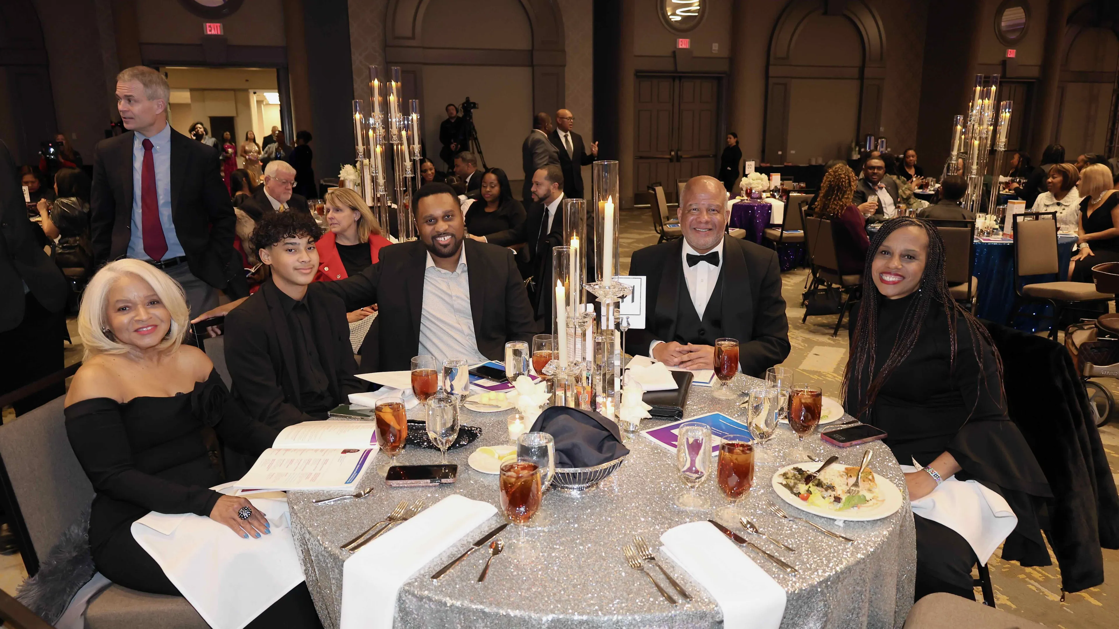 Group of adults sitting at a table