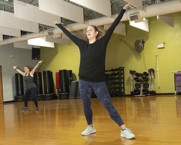 People in a YMCA dance class