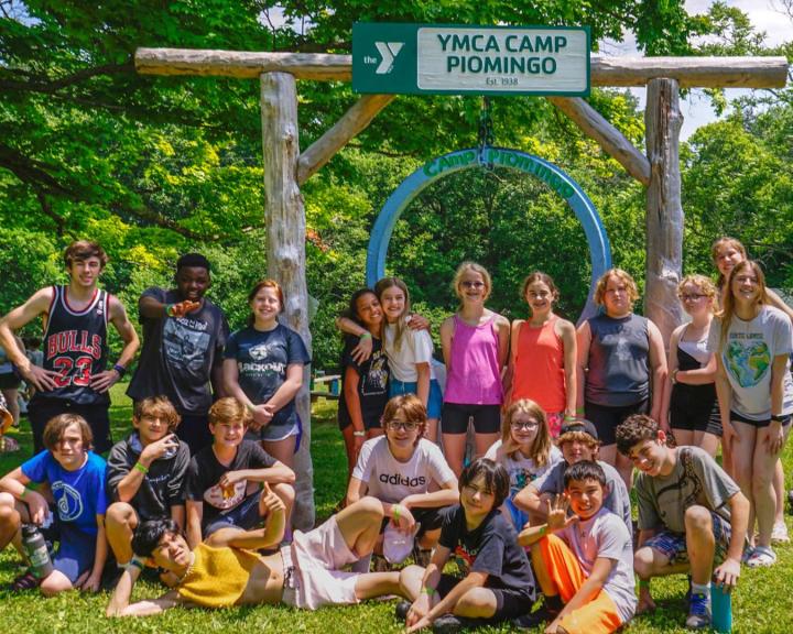 Group of happy campers at YMCA Camp Piomingo gong