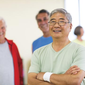 Three older adults waiting their turn to play pickleball at YMCA Louisville Three older adults waiting their turn to play pickleball at YMCA Louisville