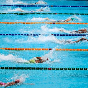 YMCA Louisville swim team members swimming laps YMCA Louisville swim team members swimming laps