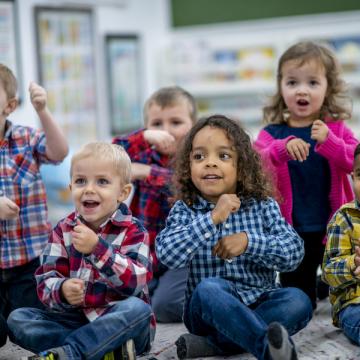 Kids playing together at YMCA child care program Kids playing together at YMCA child care program