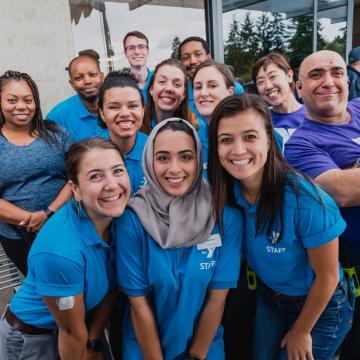 YMCA staff pose for a photo together YMCA staff pose for a photo together