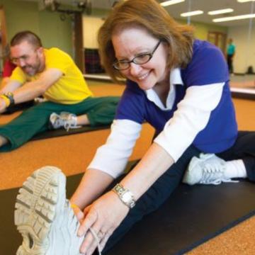 LIVESTRONG program participants stretching LIVESTRONG program participants stretching